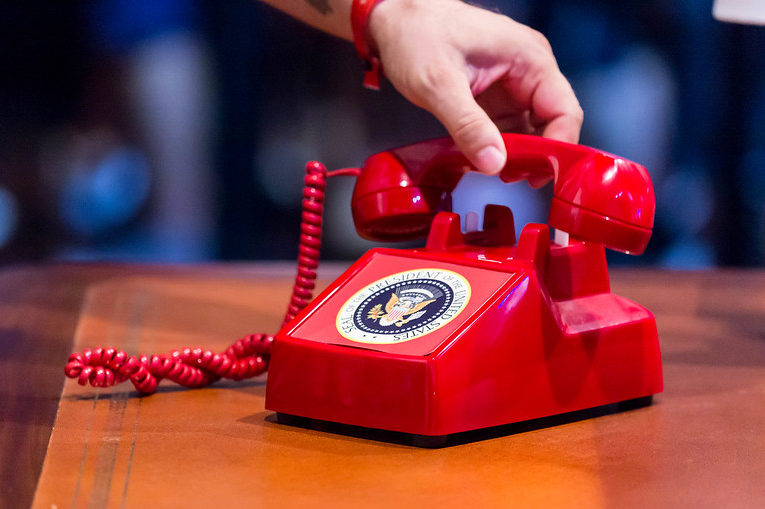 President answering the red phone
