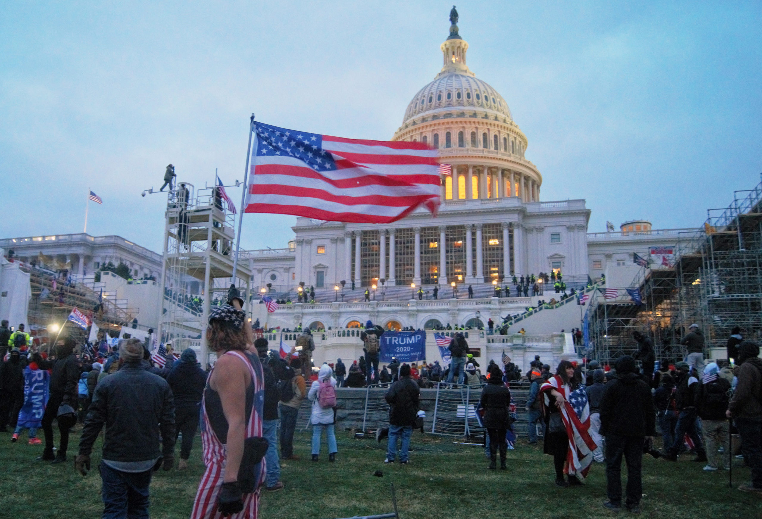 United States Capitol outside protesters with US flag